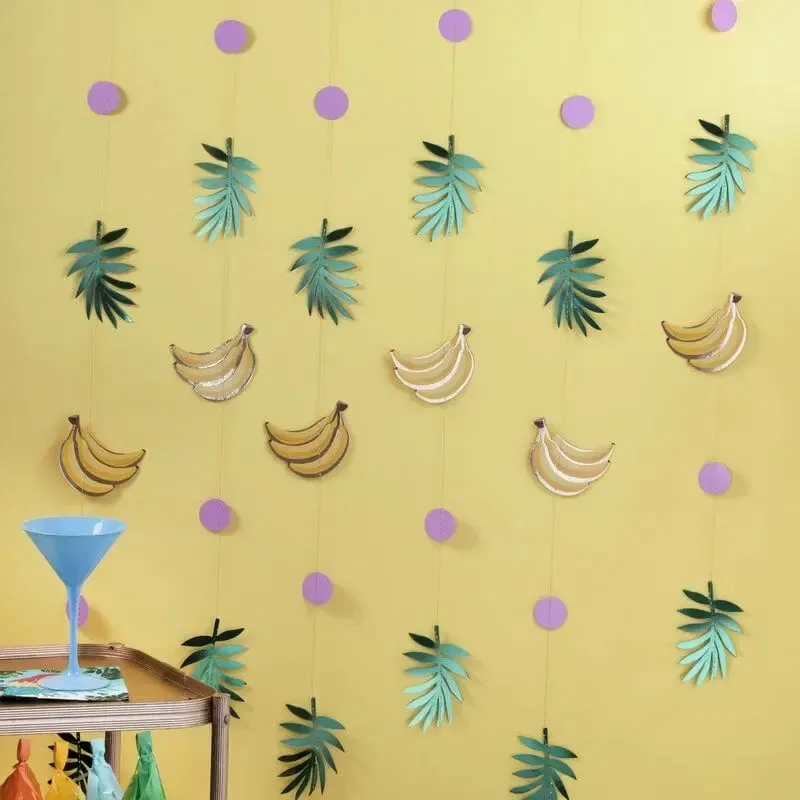 GOLD FOILED BANANA AND LEAF PARTY BACKDROP