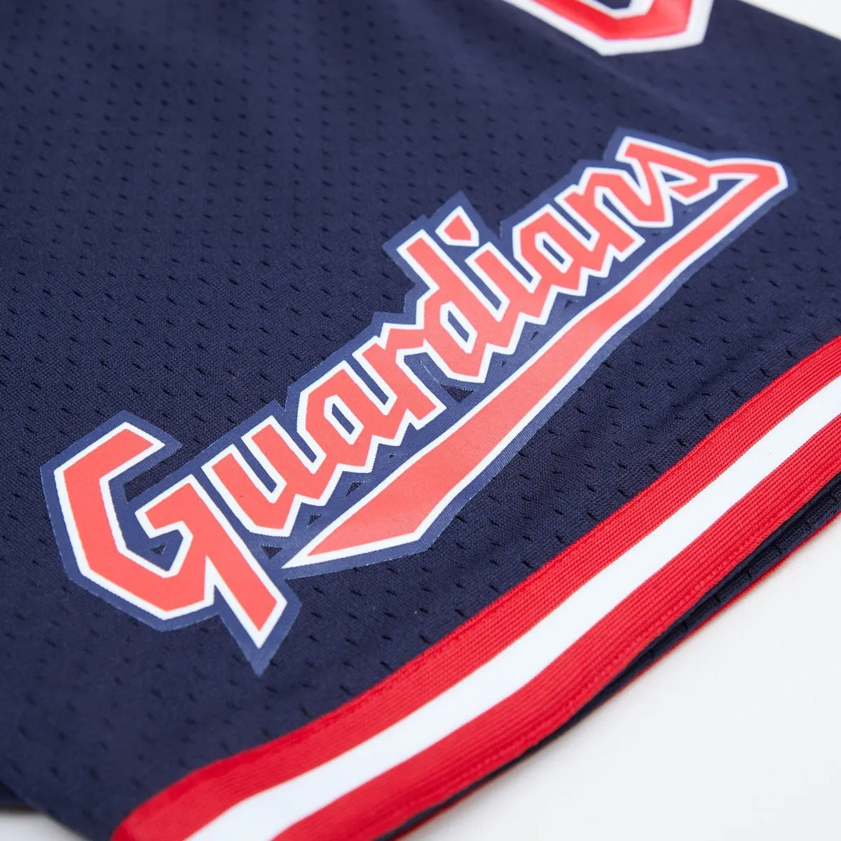 MLB CLEVELAND GUARDIANS MEN'S MESH SHORT (MIDNIGHT NAVY/RED)